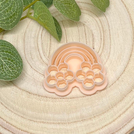 Regnbue med blomster